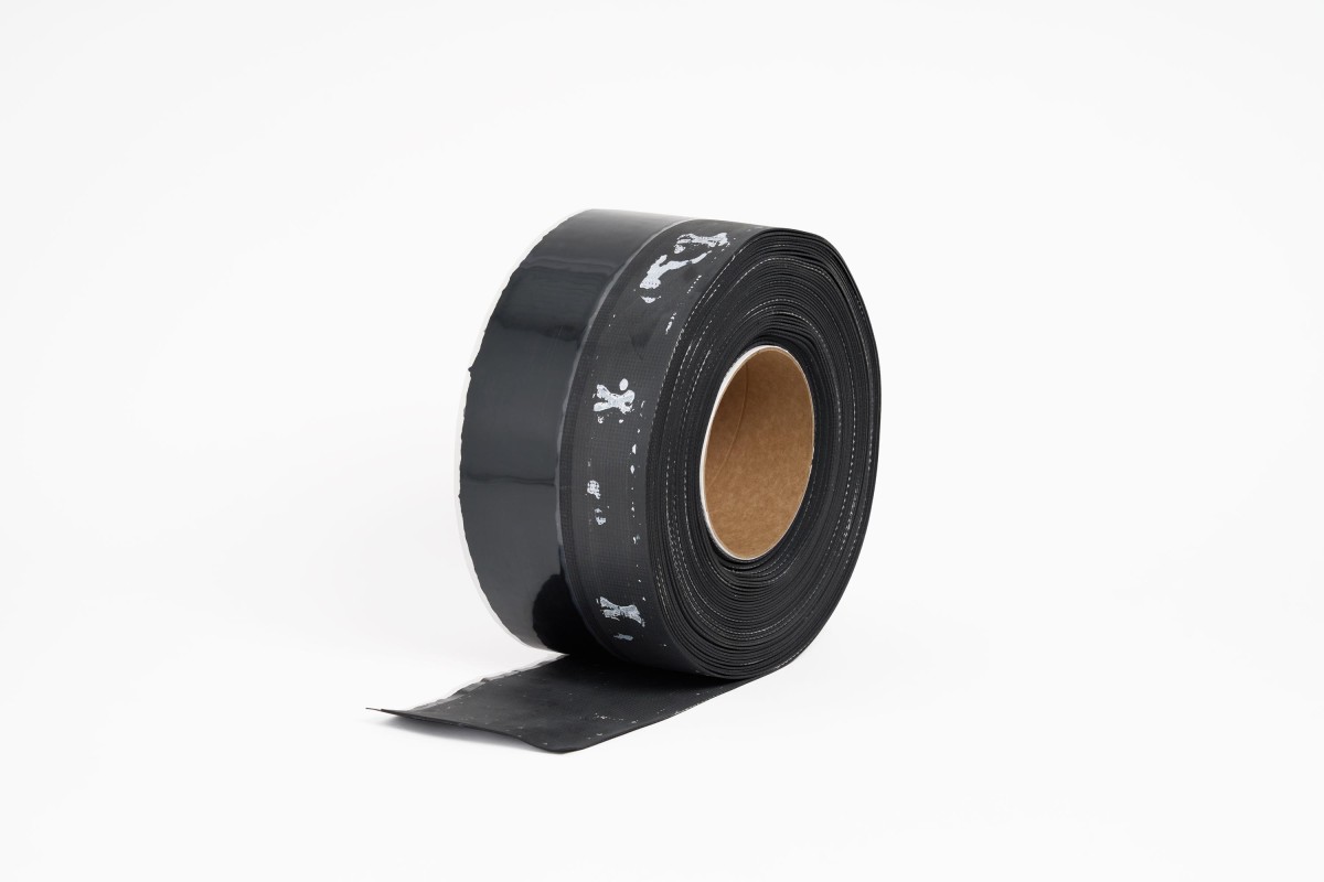 Strip of RubberGard MAX Reinforced EPDM membrane with QuickSeam tape factory-laminated to it along one edge. It is used for non-penetrating base tie-ins, as described in the Elevate guidelines.